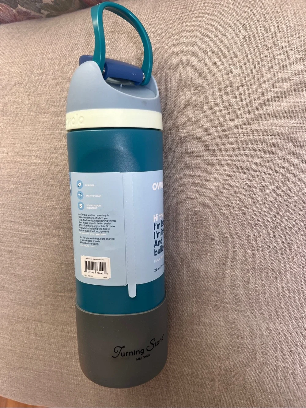 Owala FreeSip Stainless Steel Water Bottle in a 24 oz size blue & teal color